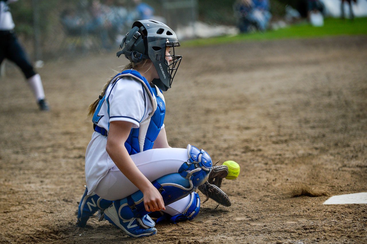 pexels-bryce-carithers-11822923 girl catching the baseball